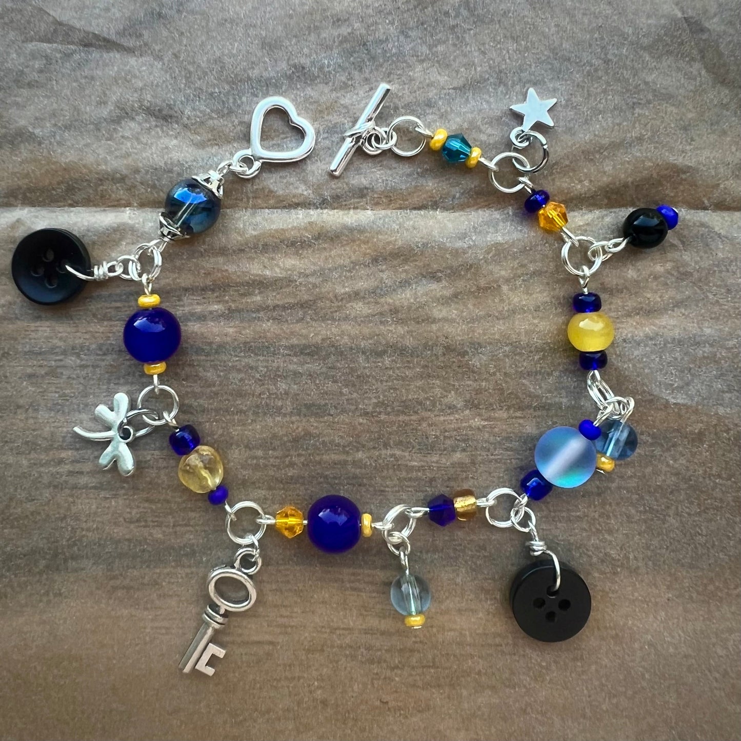 through the hidden door — coraline charm bracelet