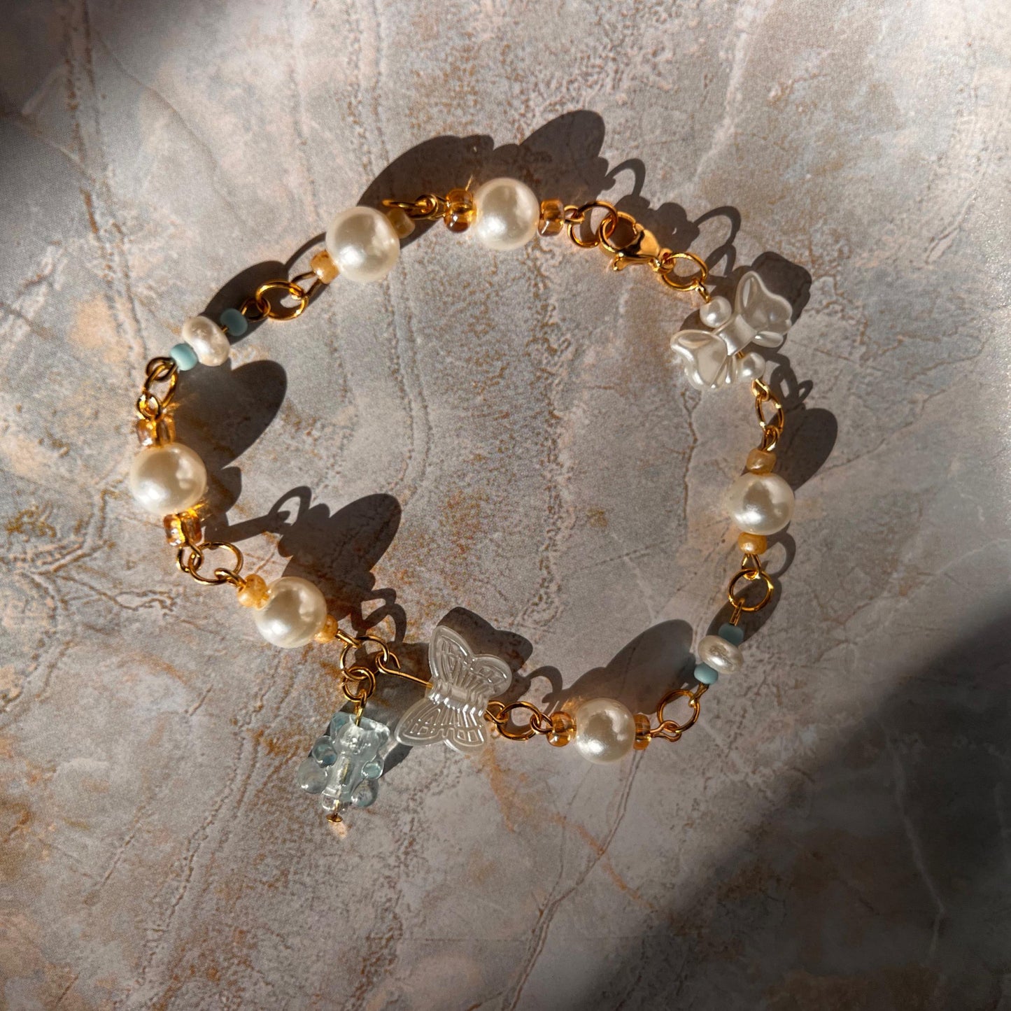 Gummy Bear Pearl Charm Bracelet – Gold-Plated Chain with Faux Pearls and Pastel Blue Beads