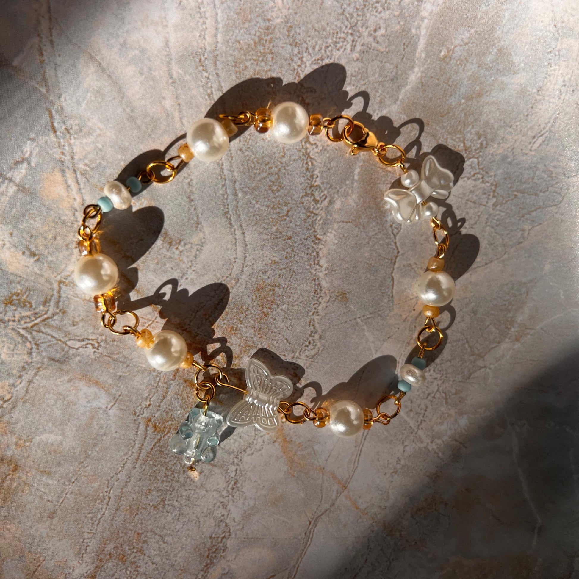 Gummy Bear Pearl Charm Bracelet – Gold-Plated Chain with Faux Pearls and Pastel Blue Beads