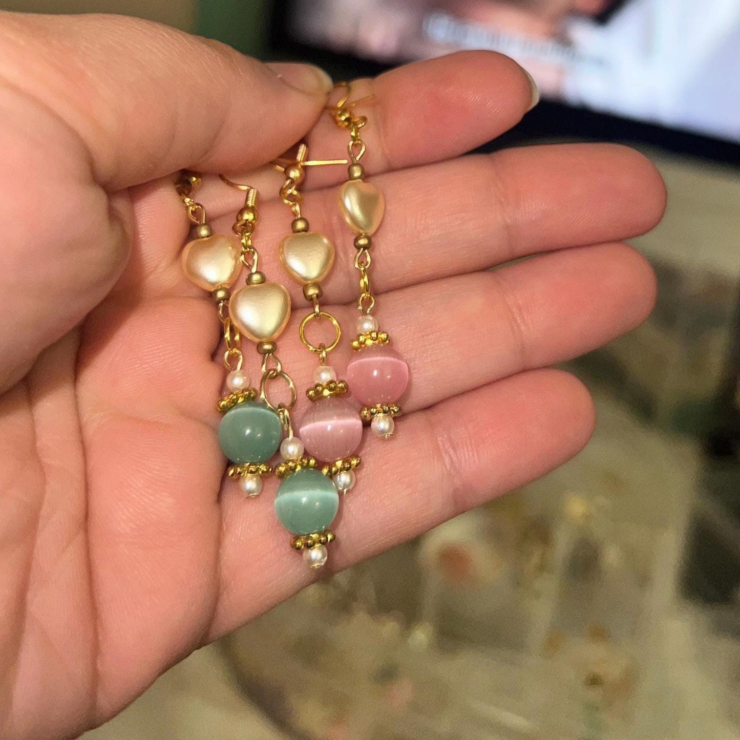 Gold Dangle Earrings with Pearl Hearts and Cat Eye Beads