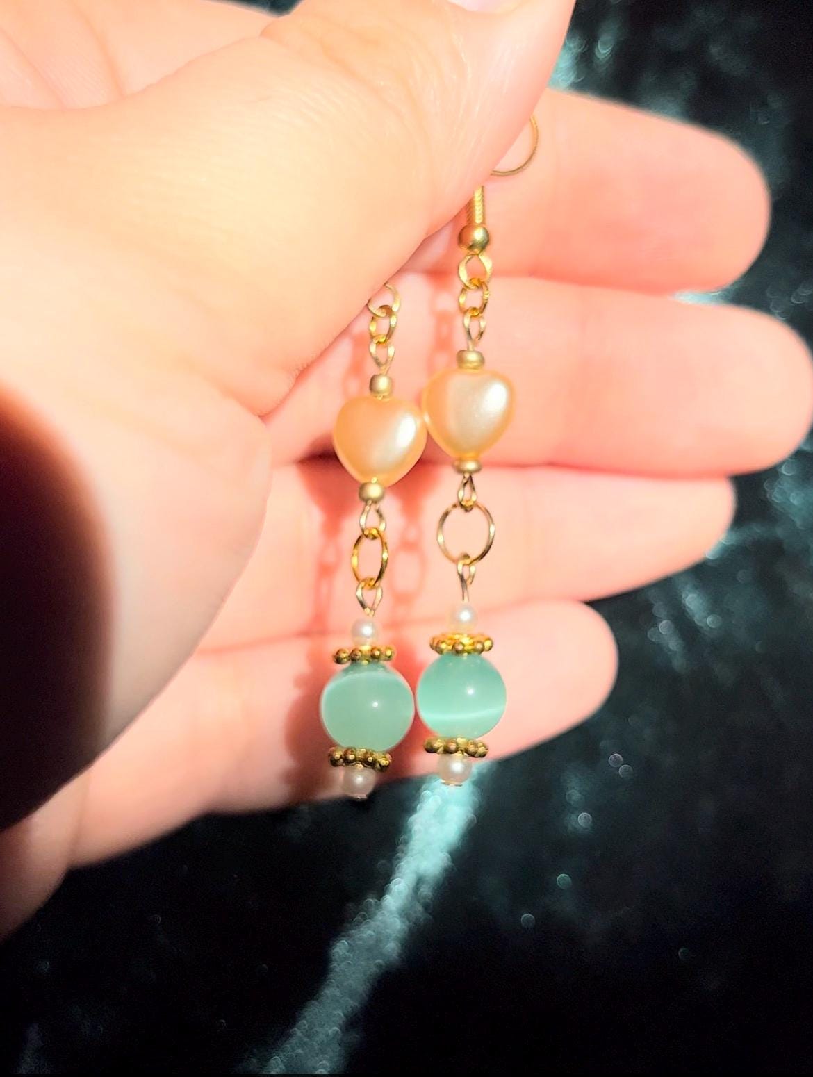 Gold Dangle Earrings with Pearl Hearts and Cat Eye Beads