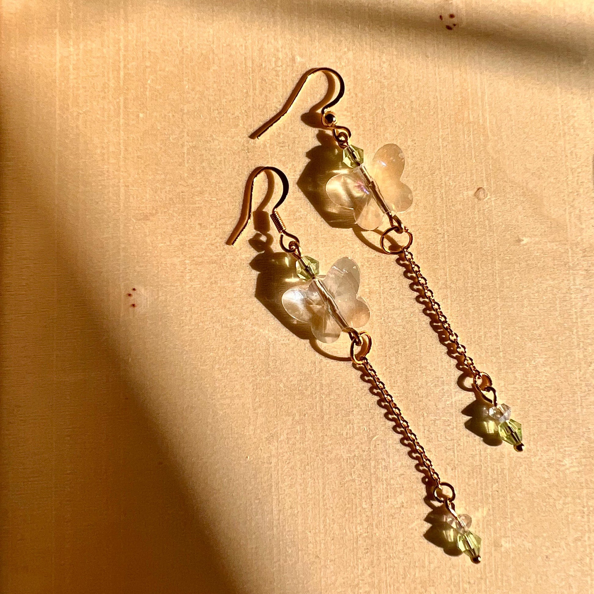 Glass Butterfly Drop Earrings: Gold-Plated Chain, Green Czech Crystal